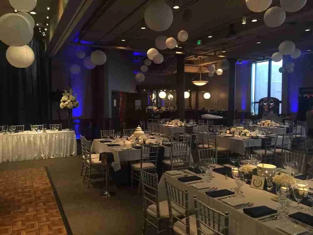 CityScape transformed with blue uplighting and paper lanterns