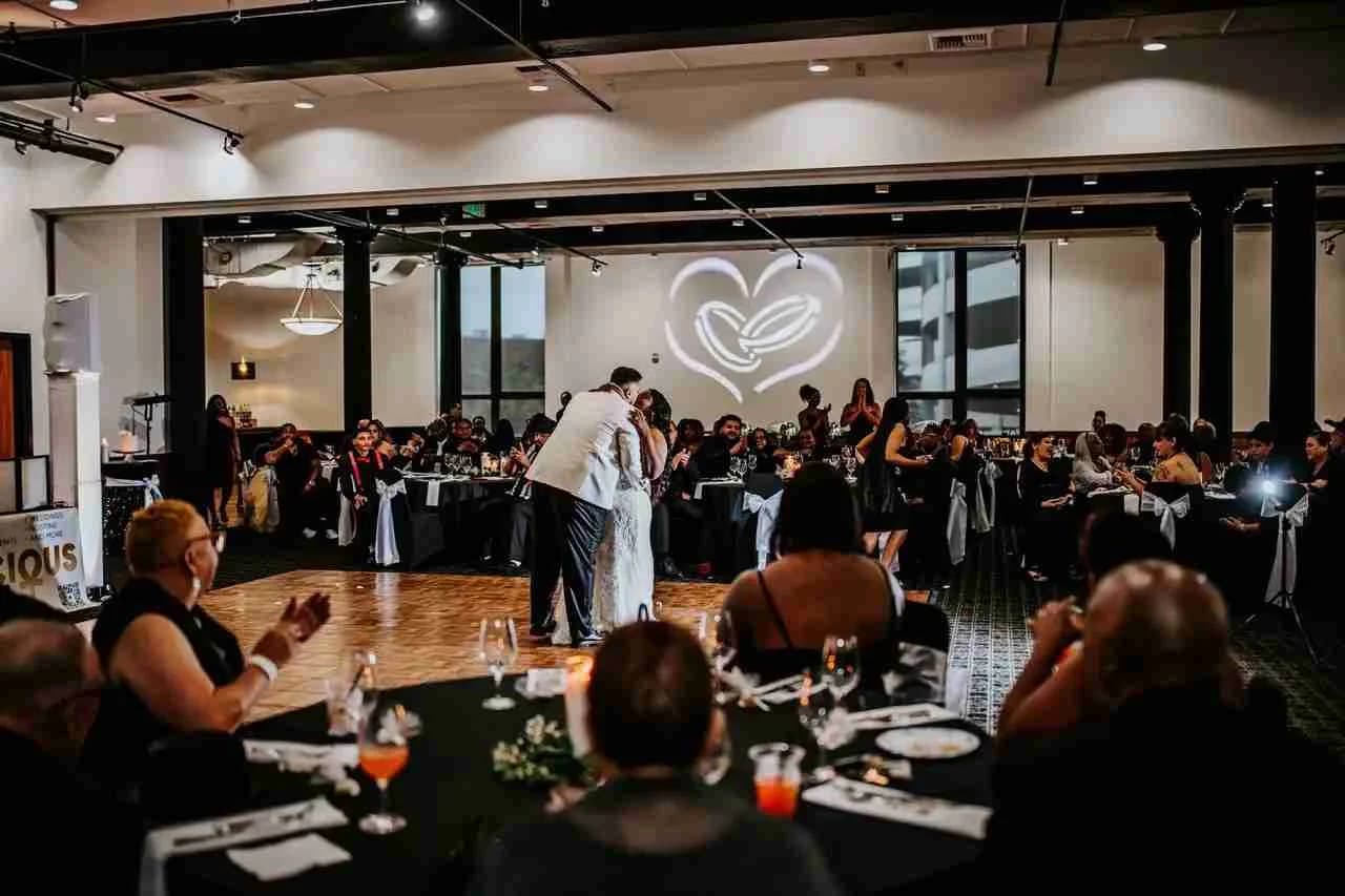 Wedding first dance at CityScape with heart lighting projection